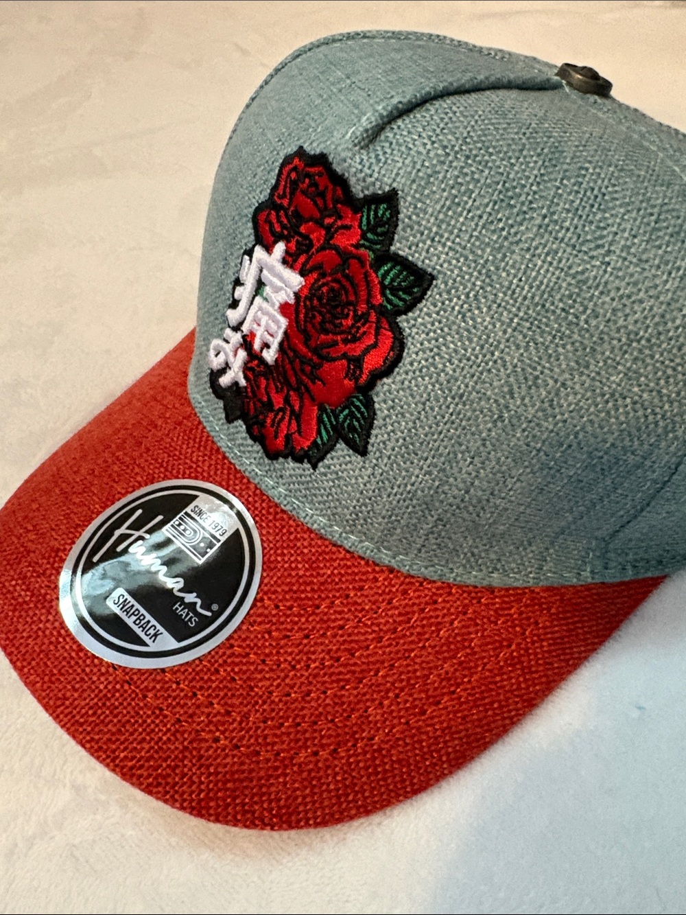 Human Hats aqua teal  & Red Floral Patch Snapback Hat